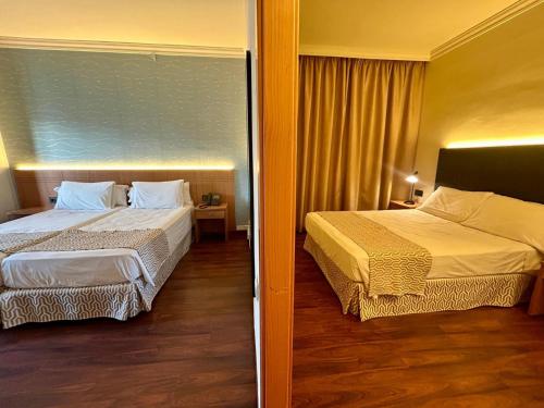 Habitación Cuádruple con balcón del hotel Santa Rosa