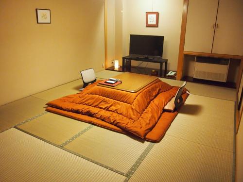 Habitación Doble Estándar de estilo japonés - 2 camas - No fumadores del hotel Oyado Koto No Yume. Foto 4