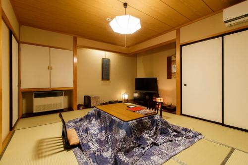 Habitación Doble Estándar de estilo japonés - 2 camas - No fumadores del hotel Oyado Koto No Yume. Foto 8