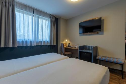 Habitación Doble - 2 camas del hotel Travelodge Barcelona Poblenou. Foto 21