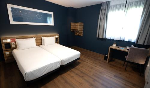 Habitación Doble adaptada para personas con discapacidad - 1 o 2 camas del hotel Travelodge Madrid Metropolitano. Foto 1