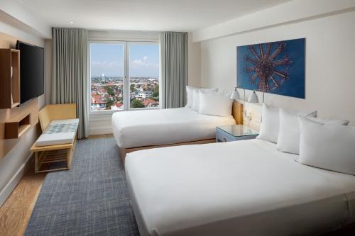 Habitación Doble Deluxe con vistas a la ciudad del hotel Allegria Hotel. Foto 1