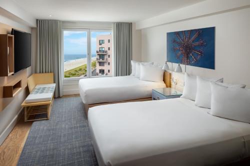 Habitación Doble con vistas parciales al mar del hotel Allegria Hotel. Foto 1