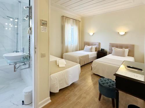Habitación Triple del hotel João Padeiro. Foto 3