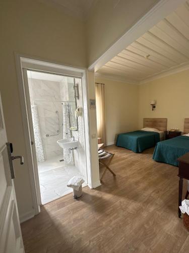 Habitación Doble adaptada para personas con discapacidad - 1 o 2 camas del hotel João Padeiro. Foto 1