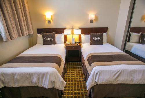 Habitación Doble Estándar - 2 camas del hotel Pointe Plaza. Foto 2