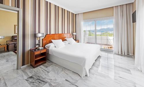 Habitación Familiar Superior del hotel Elba Motril Beach and Business. Foto 1