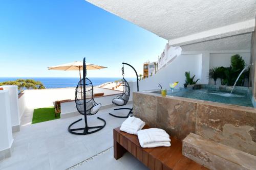 Suite Doble Deluxe - Cama grande del hotel Salobreña Suites