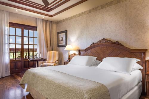 Suite Vista Jardin Vista al campo de Golf Prestige 2 Camas individuales del hotel Elba Palace Golf Boutique Hotel. Foto 2