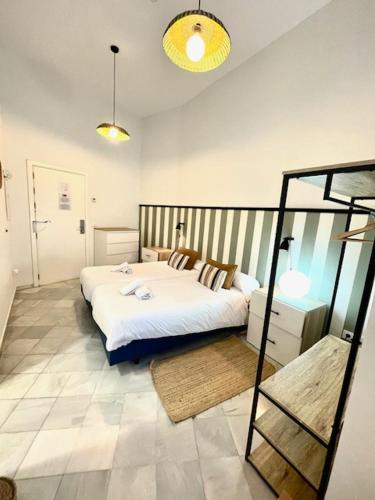 Habitación Doble con baño - 2 camas del hotel Samay Sevilla. Foto 4