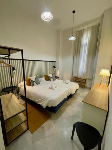 Habitación Doble con baño - 2 camas del hotel Samay Sevilla. Foto 6