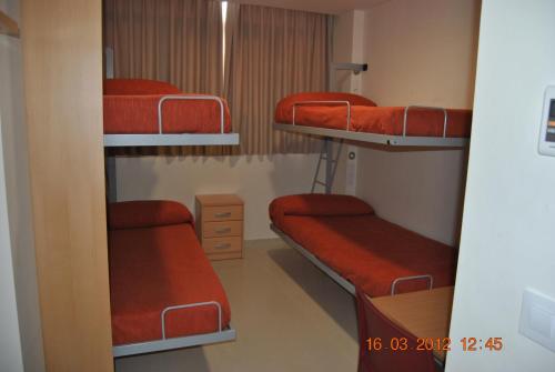 Habitación Cuádruple con baño del hotel Inturjoven Sevilla - Hostel