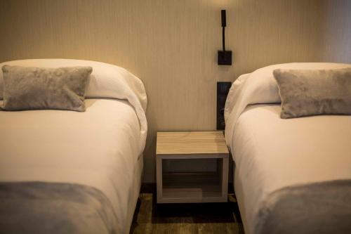 Habitación Doble con baño privado - 2 camas del hotel Sevilla Santa Justa - Adults only. Foto 9