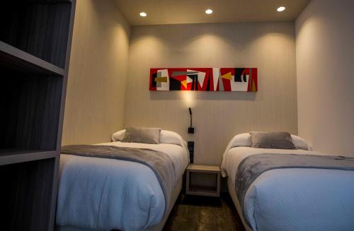 Habitación Doble con baño privado - 2 camas del hotel Sevilla Santa Justa - Adults only. Foto 10