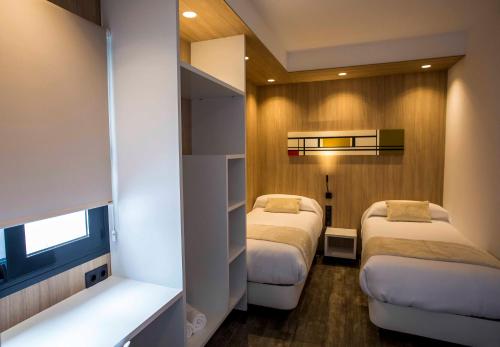 Habitación Doble con baño privado - 2 camas del hotel Sevilla Santa Justa - Adults only. Foto 31