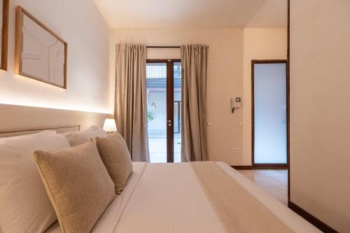 Apartamento 1 Cama king 1 habitación del hotel At Apartamentos Y Vtv Conde De Torrejon 10. Foto 2