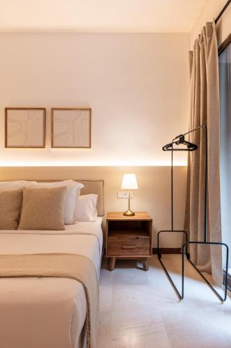 Apartamento 1 Cama king 1 habitación del hotel At Apartamentos Y Vtv Conde De Torrejon 10. Foto 9