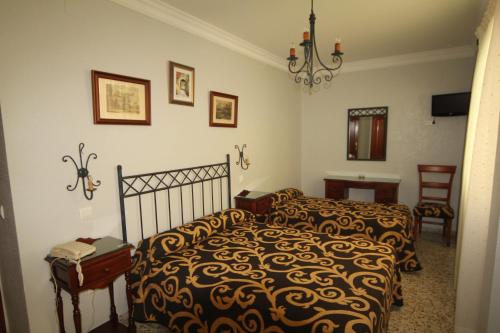 Habitación Triple del hotel Roma. Foto 4