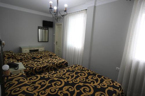 Habitación Cuádruple del hotel Roma. Foto 1