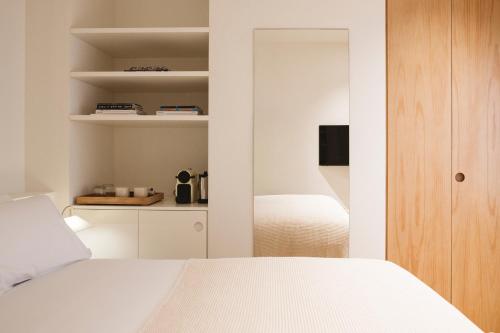 Habitación Triple del hotel Casa Teva Rooms Sevilla. Foto 6