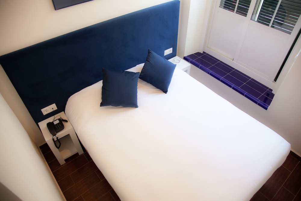 Habitación doble del hotel Noches En Triana. Foto 4