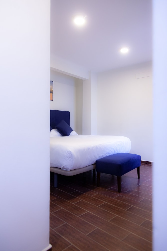 Habitación doble del hotel Noches En Triana. Foto 10