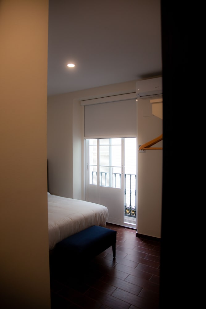 Habitación doble del hotel Noches En Triana. Foto 12