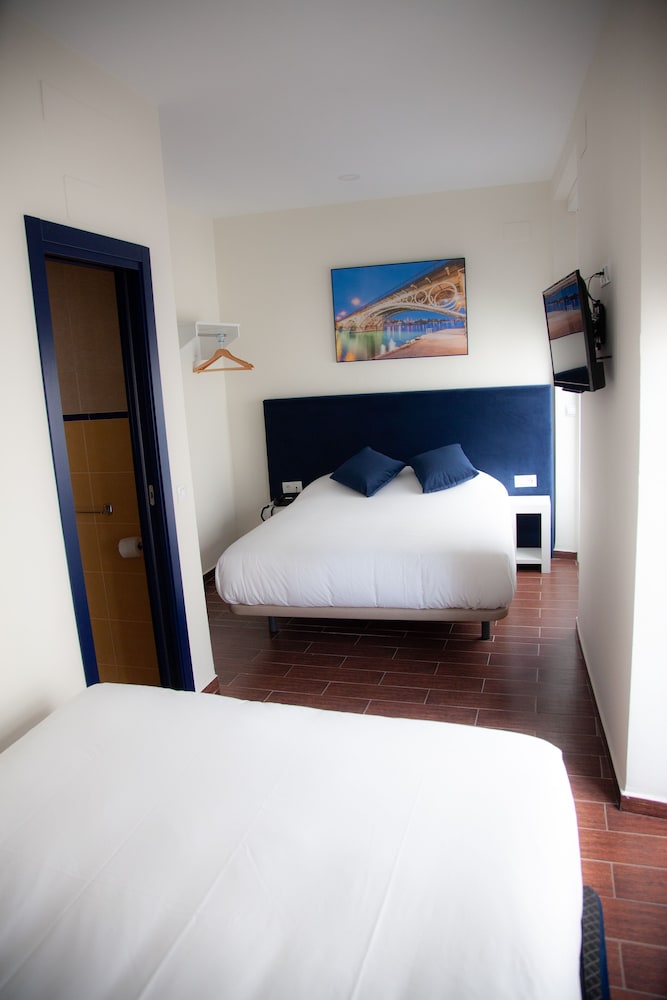 Habitación familiar del hotel Noches En Triana