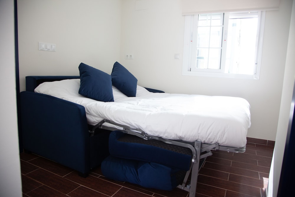 Habitación familiar del hotel Noches En Triana. Foto 4