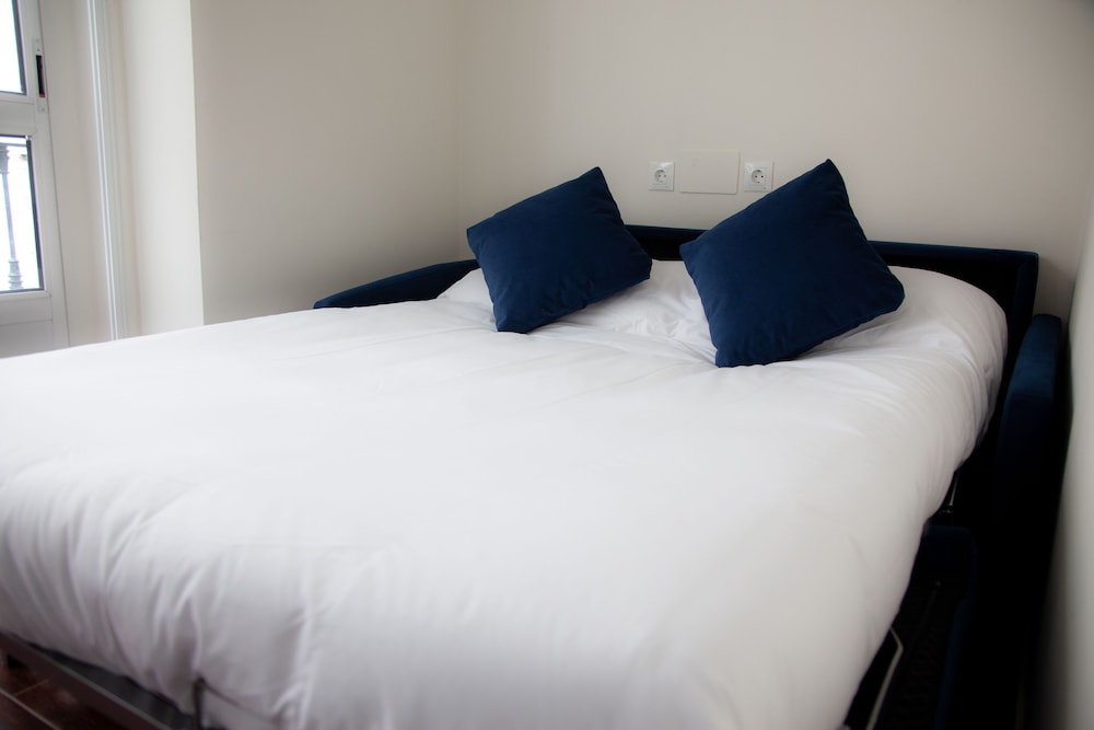 Habitación familiar del hotel Noches En Triana. Foto 14