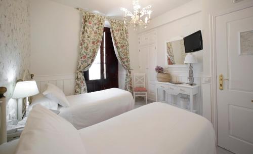 Habitación Doble Estándar - 1 o 2 camas del hotel Basic Puerta De Sevilla. Foto 1