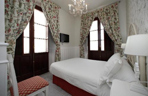 Habitación Doble Económica del hotel Basic Puerta De Sevilla. Foto 3