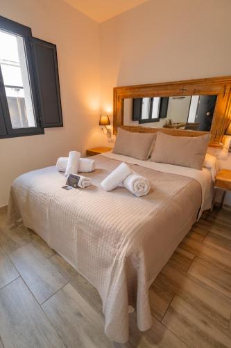 Habitación Doble con cama supletoria del hotel Center Suites San Eloy. Foto 2