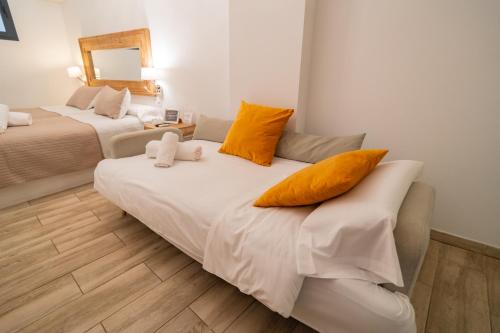 Habitación Doble con cama supletoria del hotel Center Suites San Eloy. Foto 14