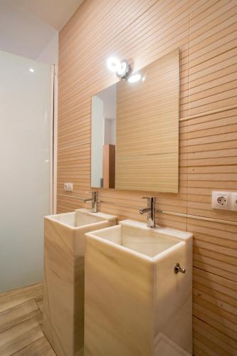 Habitación Doble con cama supletoria del hotel Center Suites San Eloy. Foto 24