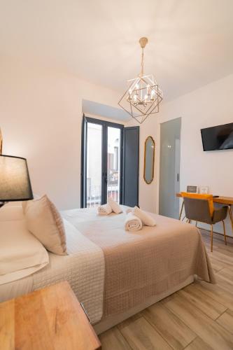 Habitación Doble del hotel Center Suites San Eloy. Foto 1