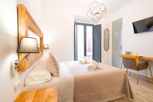 Habitación Doble del hotel Center Suites San Eloy. Foto 10