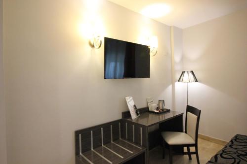 Habitación Doble con cama supletoria del hotel Venecia