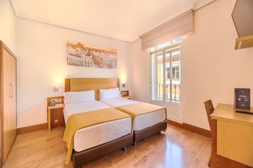 Habitación Familiar del hotel ITC Mora by Soho Boutique. Foto 4