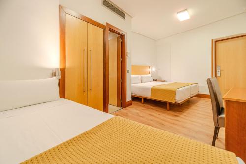 Habitación Triple del hotel ITC Mora by Soho Boutique