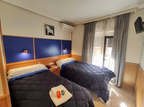 Habitación Doble del hotel Tripolis Toledo. Foto 1