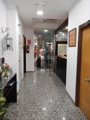 Habitación Doble Económica con cama supletoria del hotel De Los Faroles