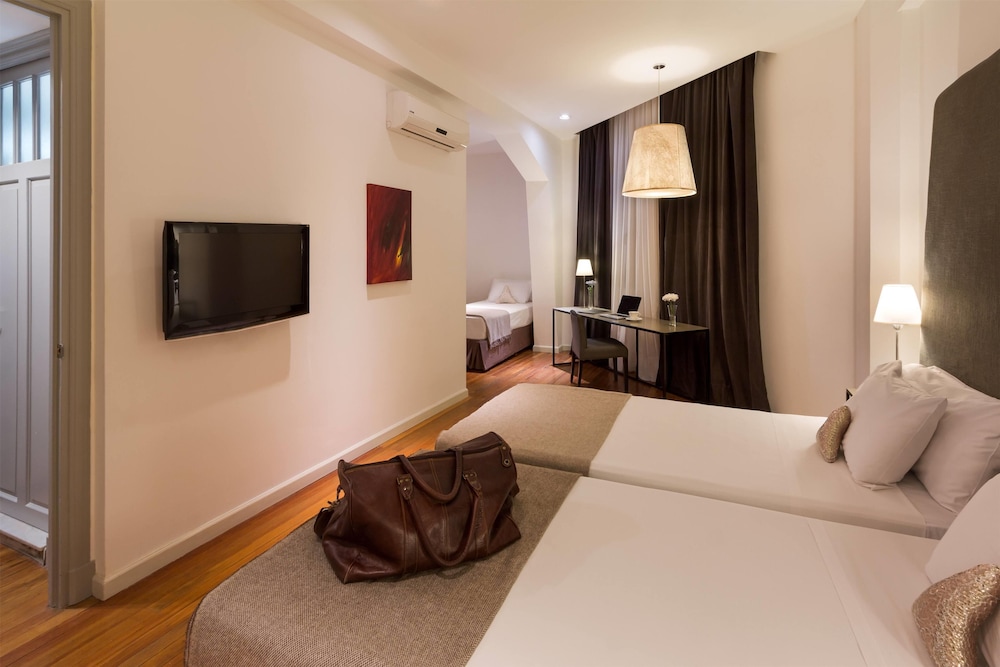 Suite, 3 camas individuales del hotel Esplendor By Wyndham Montevideo Cervantes