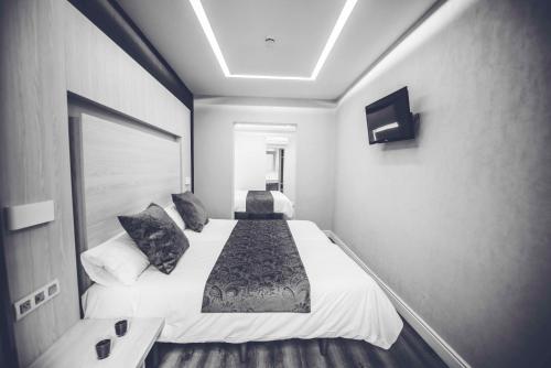 Habitación Cuádruple del hotel Lisboa. Foto 1