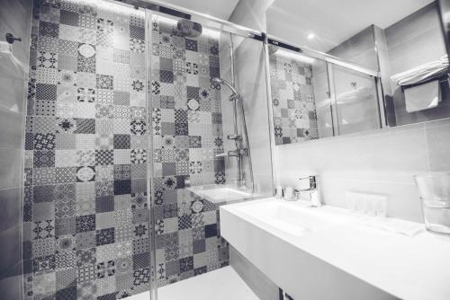 Habitación Cuádruple del hotel Lisboa. Foto 6