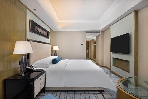 Habitación Clásica, 1 Cama King Size, Esquina del hotel Pullman Shanghai Jing An. Foto 4