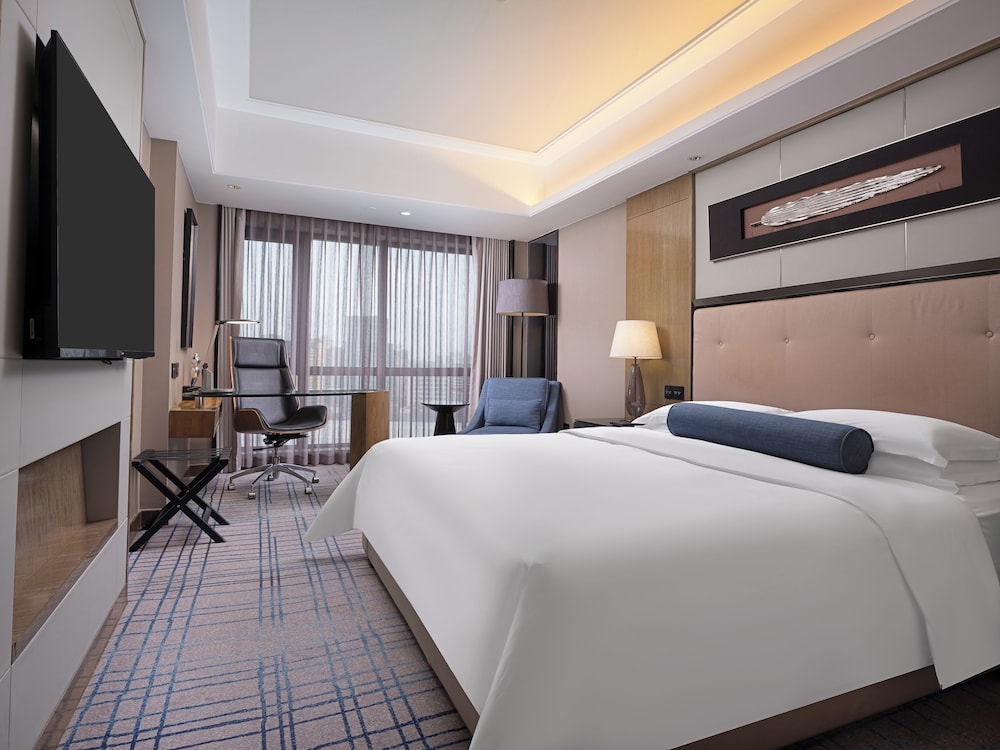 HABITACIÓN SUPERIOR, 1 Cama King Size del hotel Pullman Shanghai Jing An. Foto 7