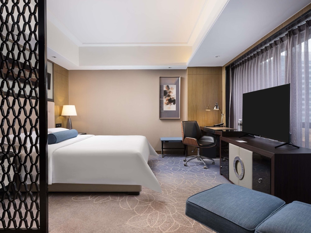 Habitación ejecutiva con 1 cama king size del hotel Pullman Shanghai Jing An