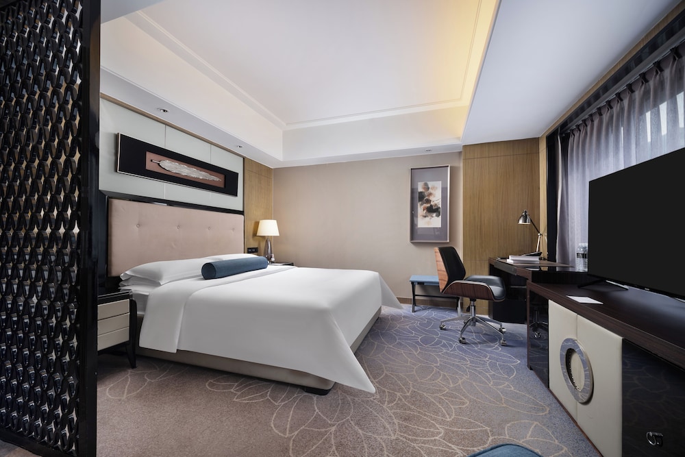 Habitación ejecutiva con 1 cama king size del hotel Pullman Shanghai Jing An. Foto 1