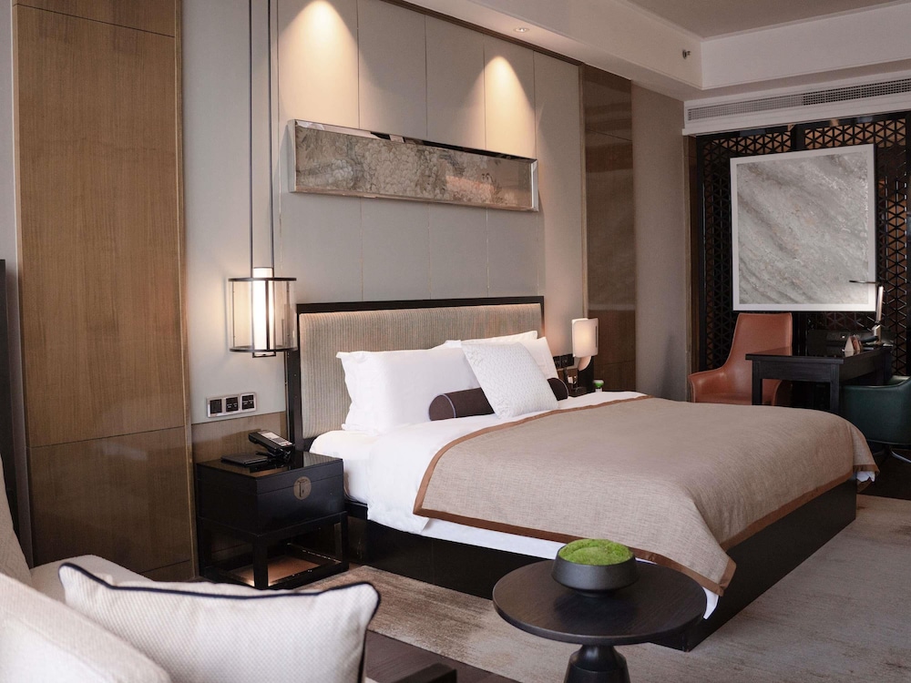 Suite CEO, 1 Cama King Size del hotel Pullman Shanghai Jing An. Foto 3